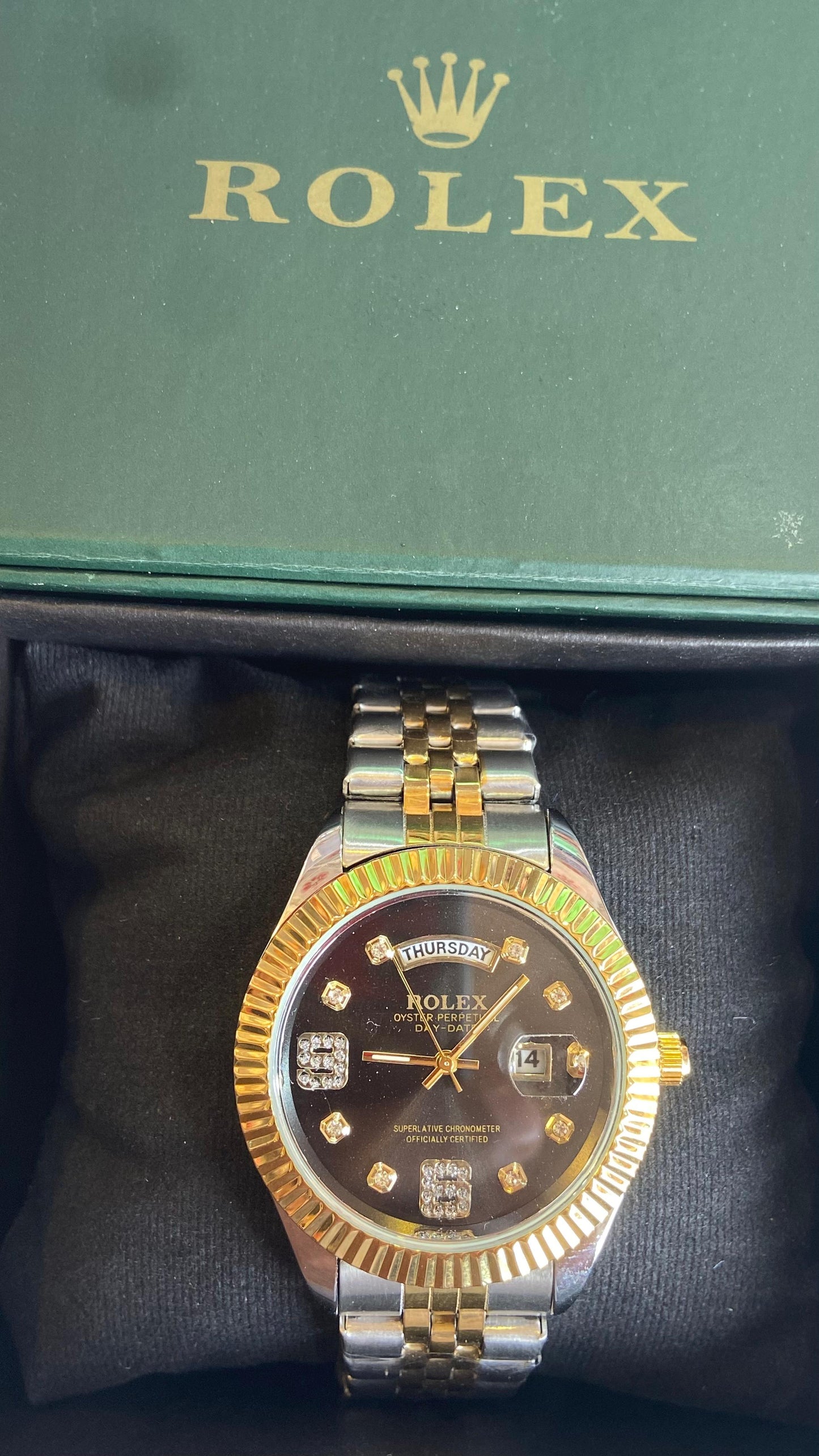The rolex watch day date time